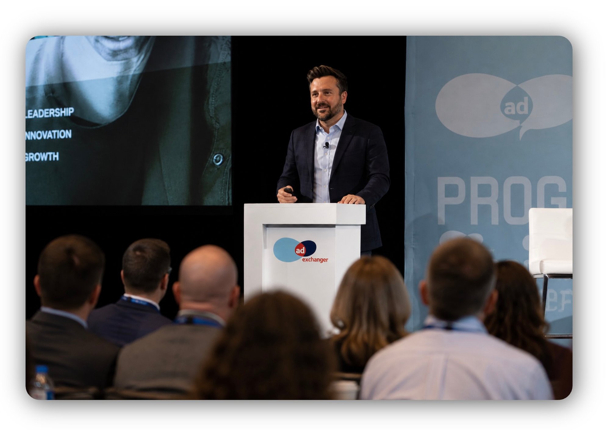 Image of Justin Moreno on stage at speaking engagement