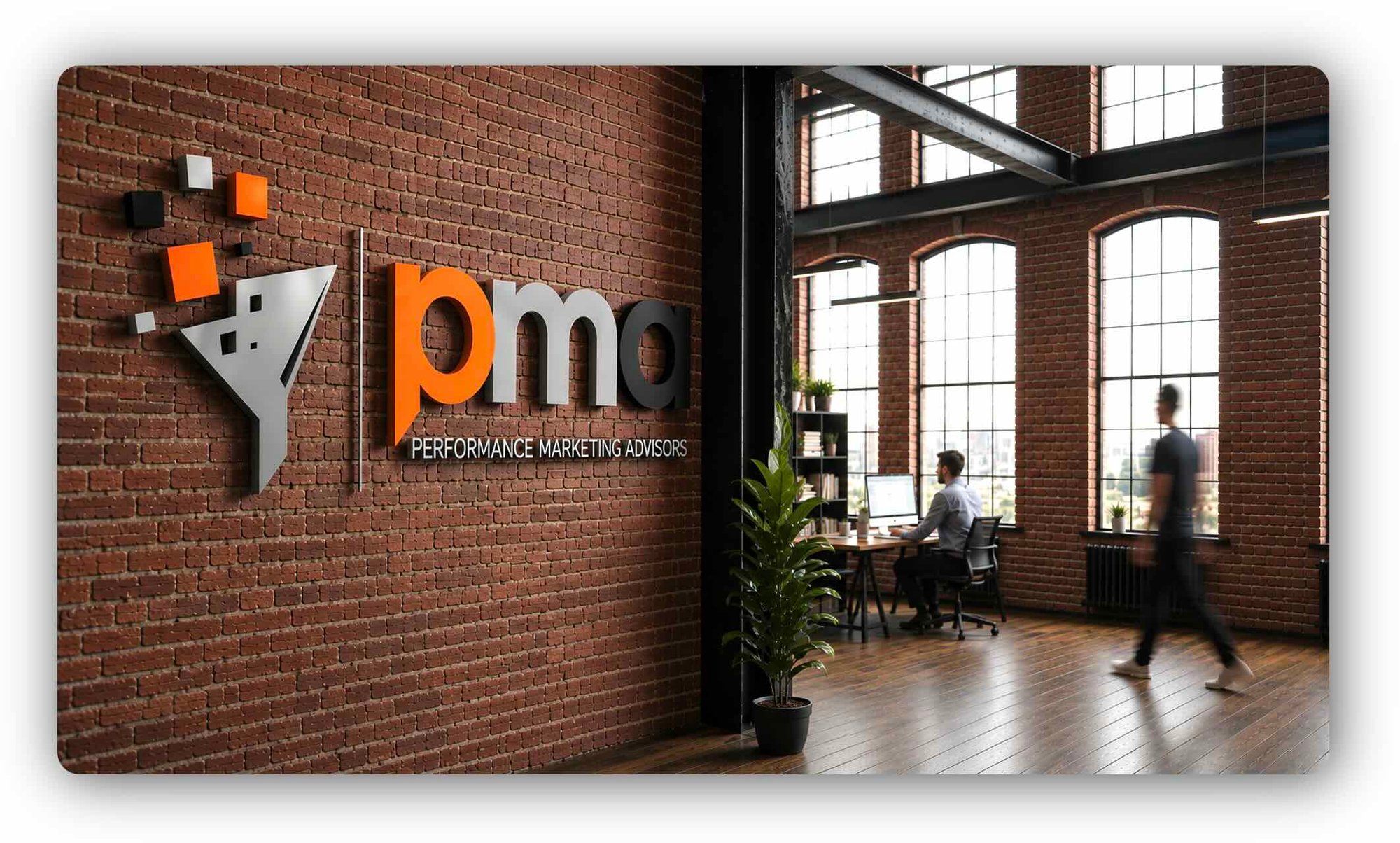 Office scene with Performance Marketing Advisors branding on wall Office scene with Performance Marketing Advisors branding on wall